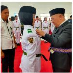 Penjabat Bupati Tanggamus Dr. Ir. Mulyadi Irsan, MT., Mengukuhkan Pasukan Pengibar Duplikat Bendera Pusaka Kabupaten Tanggamus 2024